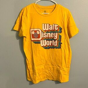 Disney World theme park shirt with distressed logo
